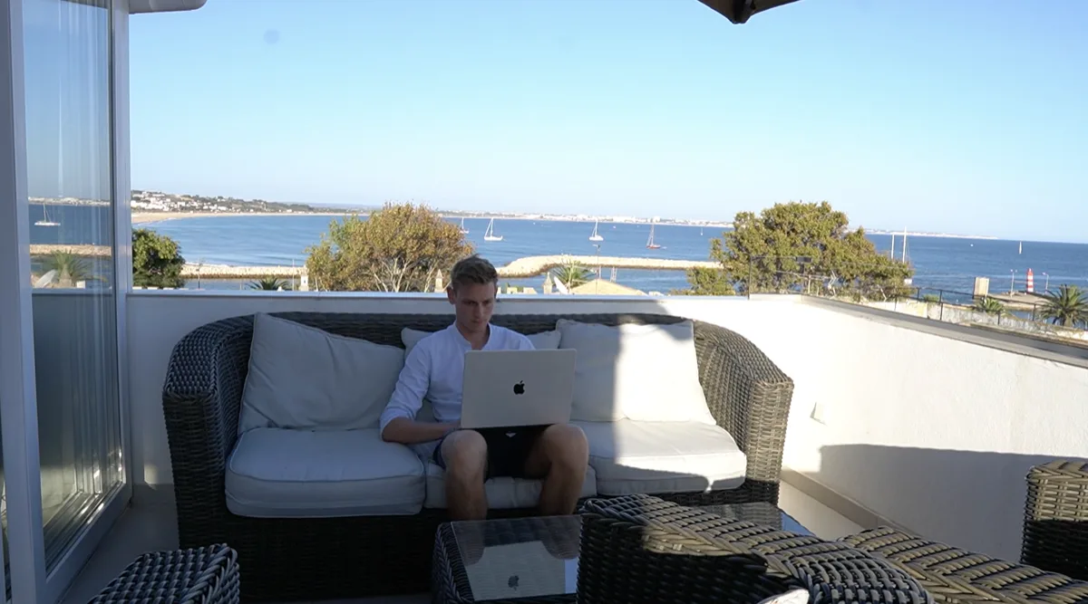 Jan working on his laptop overlooking the sea