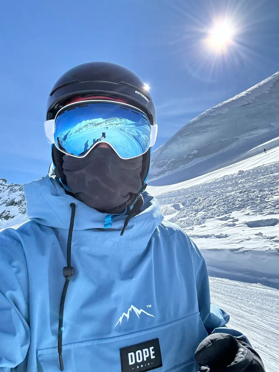 Jan in ski gear on a sunny mountain slope